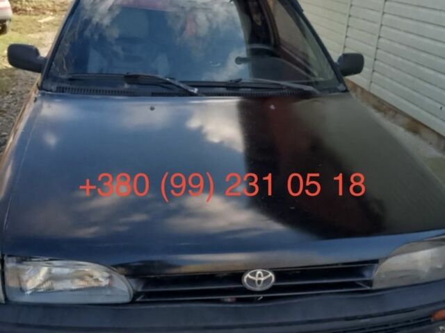 Черный Тойота Королла, объемом двигателя 1.3 л и пробегом 300 тыс. км за 800 $, фото 1 на Automoto.ua