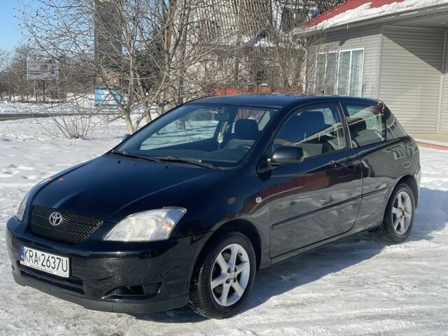 Черный Тойота Королла, объемом двигателя 2 л и пробегом 280 тыс. км за 1999 $, фото 1 на Automoto.ua