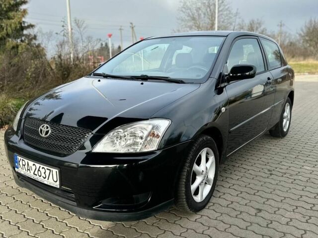 Чорний Тойота Королла, об'ємом двигуна 2 л та пробігом 2 тис. км за 2300 $, фото 1 на Automoto.ua