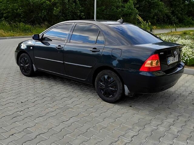 Черный Тойота Королла, объемом двигателя 1.6 л и пробегом 234 тыс. км за 2800 $, фото 1 на Automoto.ua