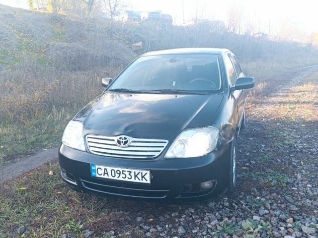 Черный Тойота Королла, объемом двигателя 1.6 л и пробегом 200 тыс. км за 3200 $, фото 1 на Automoto.ua