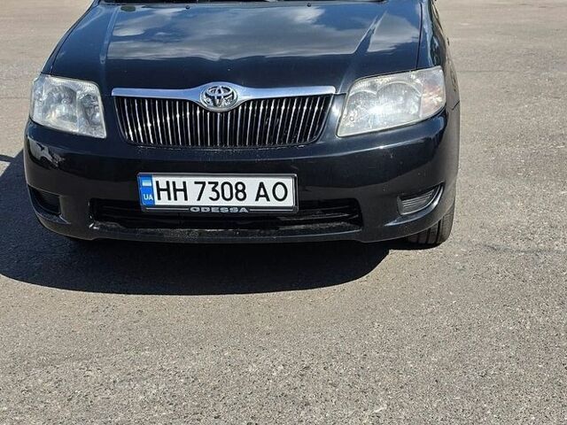 Черный Тойота Королла, объемом двигателя 1.79 л и пробегом 250 тыс. км за 4999 $, фото 1 на Automoto.ua