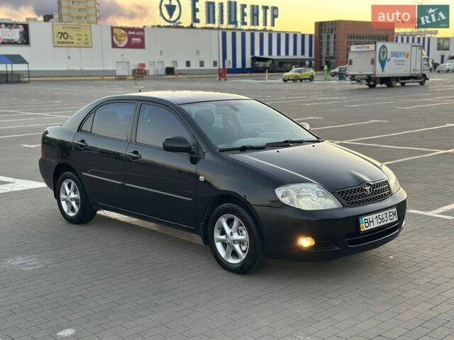 Черный Тойота Королла, объемом двигателя 1.6 л и пробегом 225 тыс. км за 5800 $, фото 1 на Automoto.ua
