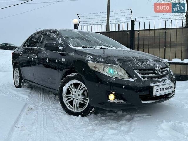 Черный Тойота Королла, объемом двигателя 1.6 л и пробегом 316 тыс. км за 6990 $, фото 1 на Automoto.ua