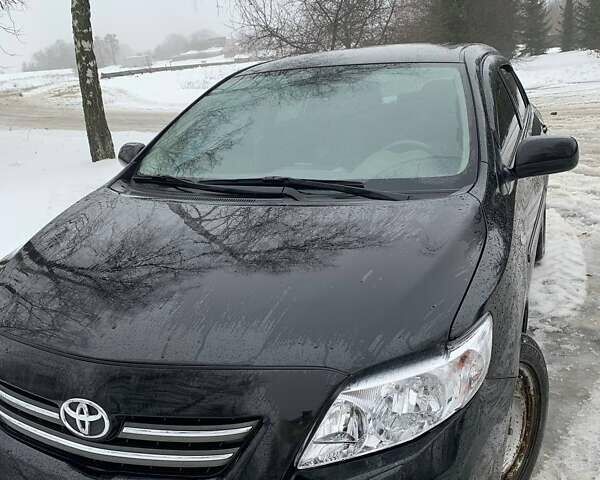 Чорний Тойота Королла, об'ємом двигуна 1.6 л та пробігом 152 тис. км за 6700 $, фото 1 на Automoto.ua