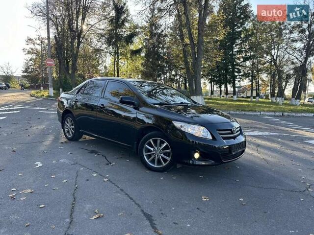 Чорний Тойота Королла, об'ємом двигуна 1.6 л та пробігом 193 тис. км за 5999 $, фото 1 на Automoto.ua