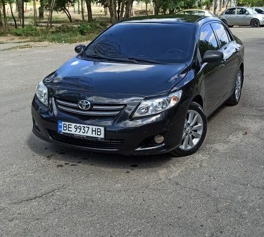 Черный Тойота Королла, объемом двигателя 1.6 л и пробегом 228 тыс. км за 5748 $, фото 1 на Automoto.ua