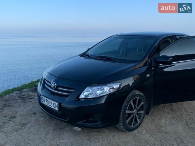 Черный Тойота Королла, объемом двигателя 1.79 л и пробегом 250 тыс. км за 7500 $, фото 1 на Automoto.ua