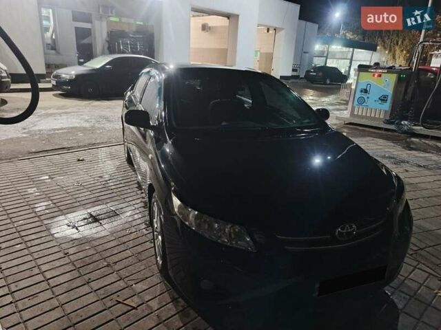 Чорний Тойота Королла, об'ємом двигуна 1.6 л та пробігом 207 тис. км за 6900 $, фото 1 на Automoto.ua