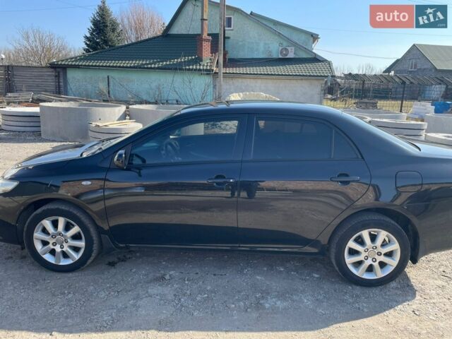 Чорний Тойота Королла, об'ємом двигуна 1.6 л та пробігом 257 тис. км за 6150 $, фото 1 на Automoto.ua