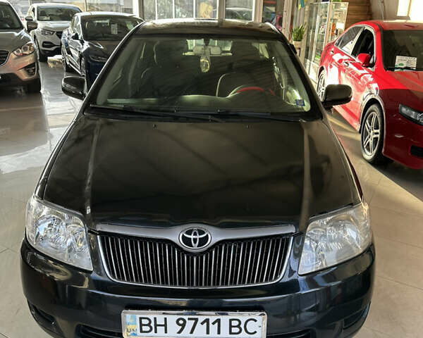 Черный Тойота Королла, объемом двигателя 1.8 л и пробегом 300 тыс. км за 6900 $, фото 1 на Automoto.ua