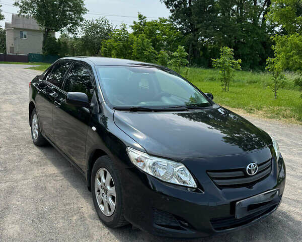 Черный Тойота Королла, объемом двигателя 1.59 л и пробегом 177 тыс. км за 7000 $, фото 1 на Automoto.ua