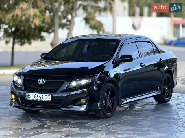 Чорний Тойота Королла, об'ємом двигуна 1.6 л та пробігом 221 тис. км за 6799 $, фото 1 на Automoto.ua