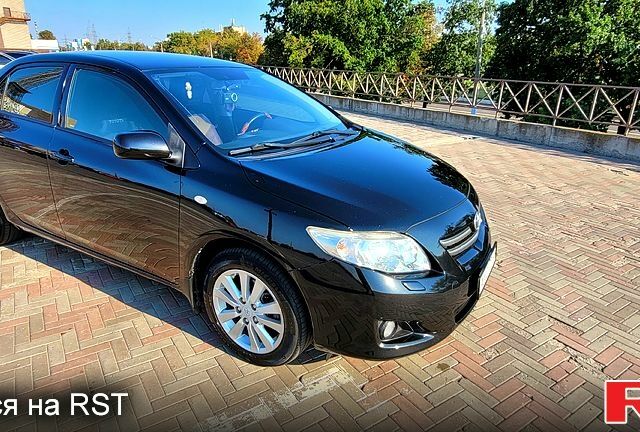 Чорний Тойота Королла, об'ємом двигуна 1.6 л та пробігом 254 тис. км за 6700 $, фото 1 на Automoto.ua