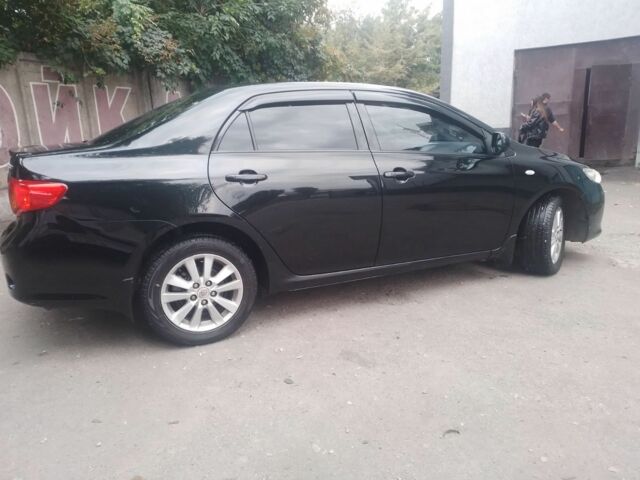 Черный Тойота Королла, объемом двигателя 1.6 л и пробегом 271 тыс. км за 7500 $, фото 1 на Automoto.ua