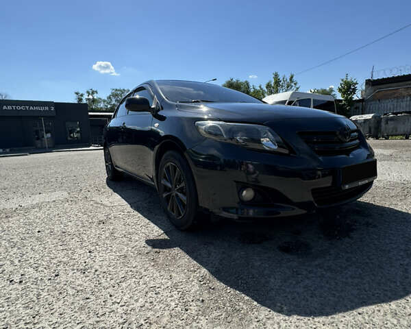 Чорний Тойота Королла, об'ємом двигуна 1.6 л та пробігом 201 тис. км за 7000 $, фото 1 на Automoto.ua