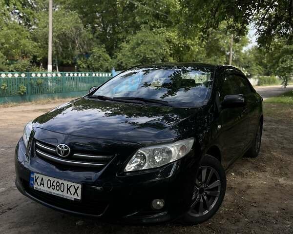 Черный Тойота Королла, объемом двигателя 1.6 л и пробегом 250 тыс. км за 7999 $, фото 1 на Automoto.ua