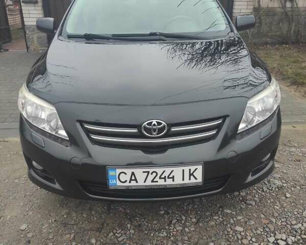 Чорний Тойота Королла, об'ємом двигуна 1.6 л та пробігом 195 тис. км за 8500 $, фото 1 на Automoto.ua