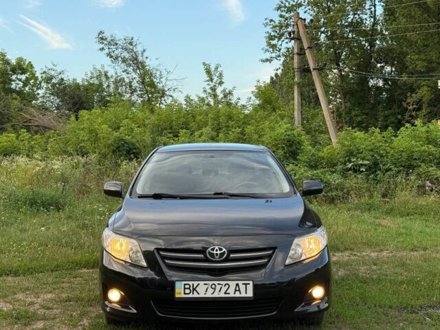 Чорний Тойота Королла, об'ємом двигуна 1.6 л та пробігом 265 тис. км за 6800 $, фото 1 на Automoto.ua