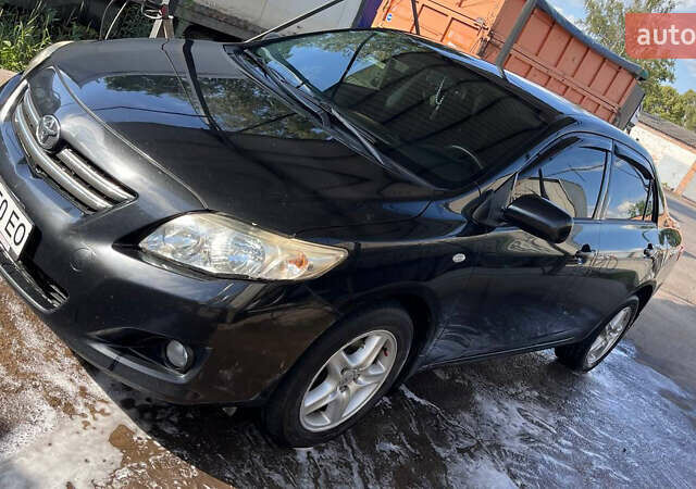 Черный Тойота Королла, объемом двигателя 1.6 л и пробегом 183 тыс. км за 7500 $, фото 1 на Automoto.ua