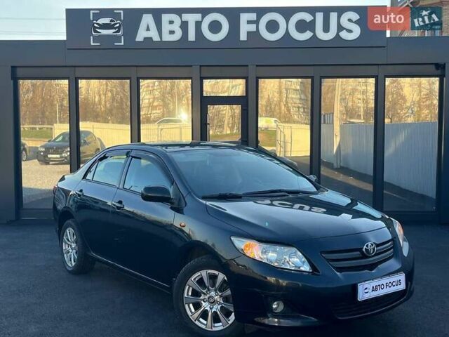 Черный Тойота Королла, объемом двигателя 1.6 л и пробегом 186 тыс. км за 6990 $, фото 1 на Automoto.ua