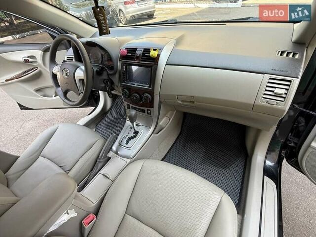 Черный Тойота Королла, объемом двигателя 1.8 л и пробегом 289 тыс. км за 7599 $, фото 1 на Automoto.ua