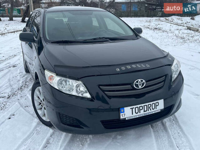 Чорний Тойота Королла, об'ємом двигуна 1.6 л та пробігом 136 тис. км за 8300 $, фото 1 на Automoto.ua