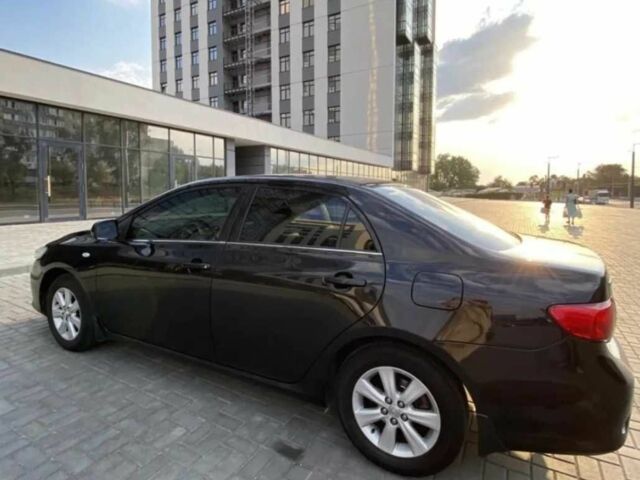 Черный Тойота Королла, объемом двигателя 1.8 л и пробегом 240 тыс. км за 7999 $, фото 1 на Automoto.ua