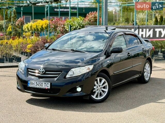 Чорний Тойота Королла, об'ємом двигуна 1.6 л та пробігом 181 тис. км за 8650 $, фото 1 на Automoto.ua