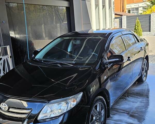 Чорний Тойота Королла, об'ємом двигуна 1.6 л та пробігом 170 тис. км за 5800 $, фото 1 на Automoto.ua