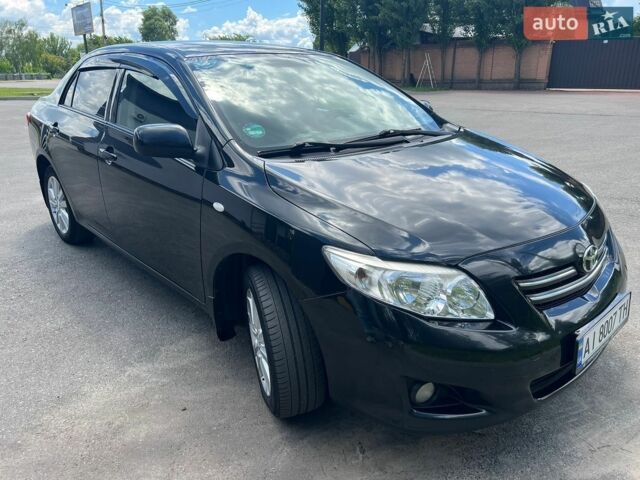 Чорний Тойота Королла, об'ємом двигуна 1.6 л та пробігом 240 тис. км за 6800 $, фото 1 на Automoto.ua