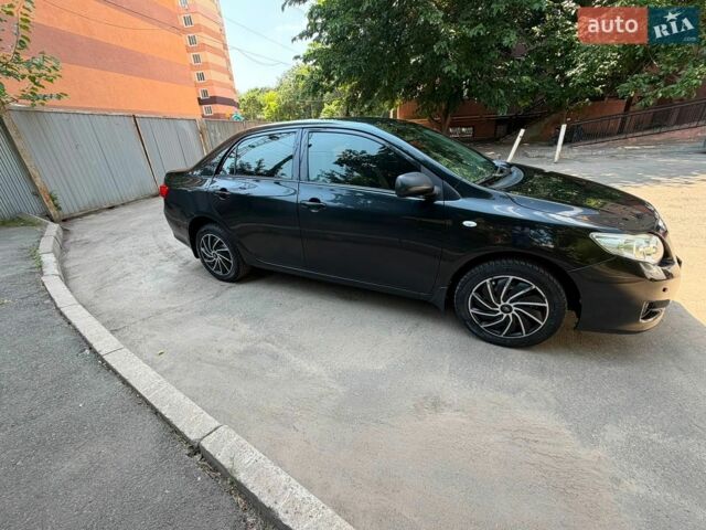 Черный Тойота Королла, объемом двигателя 1.6 л и пробегом 205 тыс. км за 7500 $, фото 1 на Automoto.ua