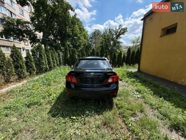 Чорний Тойота Королла, об'ємом двигуна 1.6 л та пробігом 235 тис. км за 1950 $, фото 1 на Automoto.ua