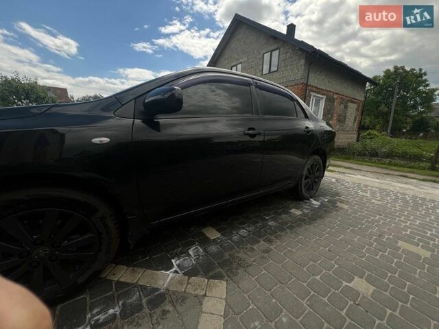 Черный Тойота Королла, объемом двигателя 1.6 л и пробегом 266 тыс. км за 7300 $, фото 1 на Automoto.ua