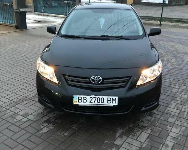 Чорний Тойота Королла, об'ємом двигуна 1.6 л та пробігом 305 тис. км за 6300 $, фото 1 на Automoto.ua