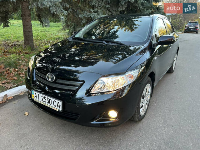 Черный Тойота Королла, объемом двигателя 1.6 л и пробегом 42 тыс. км за 10300 $, фото 1 на Automoto.ua