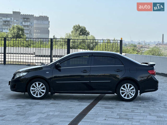 Черный Тойота Королла, объемом двигателя 1.6 л и пробегом 130 тыс. км за 9850 $, фото 1 на Automoto.ua