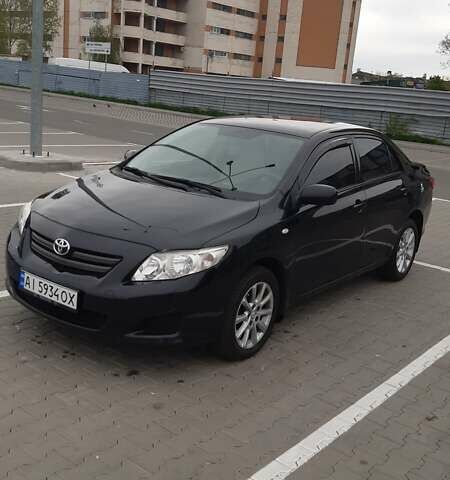 Черный Тойота Королла, объемом двигателя 1.6 л и пробегом 240 тыс. км за 8000 $, фото 1 на Automoto.ua