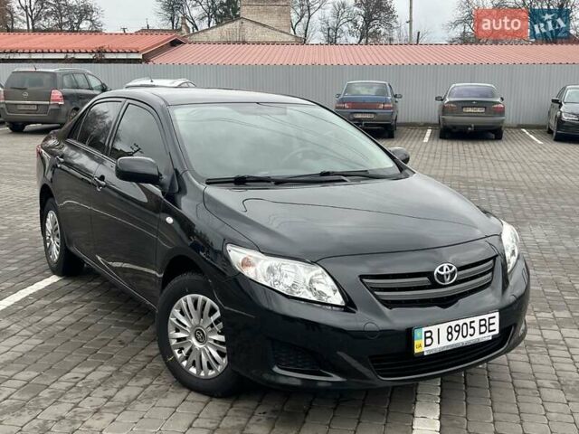 Черный Тойота Королла, объемом двигателя 1.3 л и пробегом 204 тыс. км за 6750 $, фото 1 на Automoto.ua