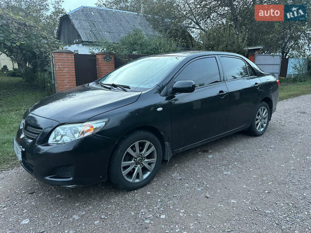Черный Тойота Королла, объемом двигателя 1.6 л и пробегом 220 тыс. км за 5900 $, фото 1 на Automoto.ua