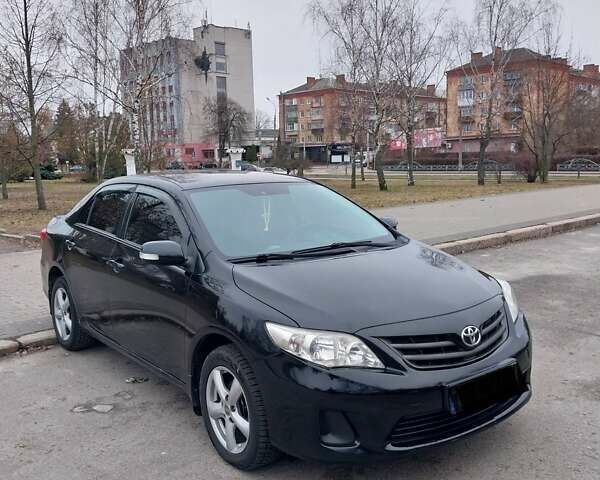 Чорний Тойота Королла, об'ємом двигуна 1.33 л та пробігом 132 тис. км за 8700 $, фото 1 на Automoto.ua