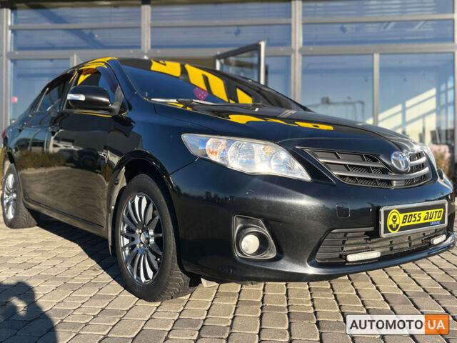 Черный Тойота Королла, объемом двигателя 1.4 л и пробегом 169 тыс. км за 8000 $, фото 1 на Automoto.ua