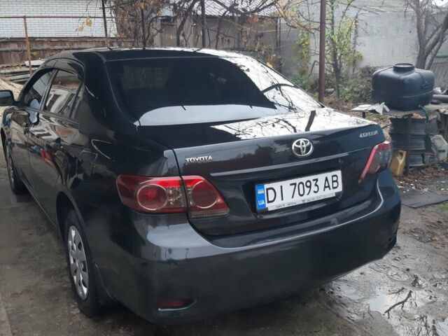 Черный Тойота Королла, объемом двигателя 1.33 л и пробегом 152 тыс. км за 8500 $, фото 1 на Automoto.ua