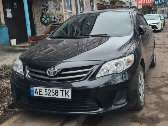 Черный Тойота Королла, объемом двигателя 1.33 л и пробегом 269 тыс. км за 7200 $, фото 1 на Automoto.ua