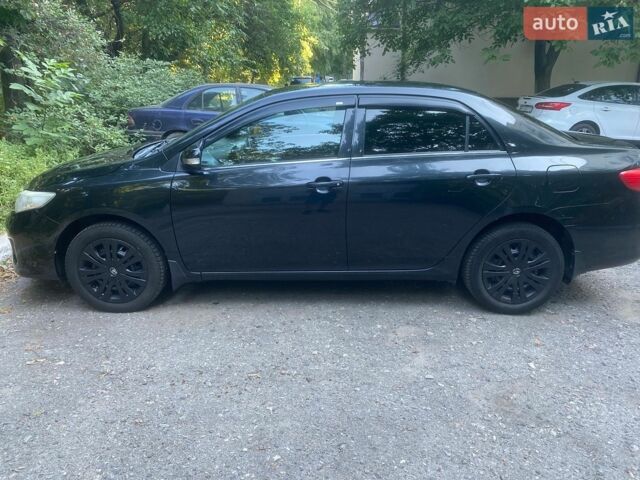 Черный Тойота Королла, объемом двигателя 1.6 л и пробегом 175 тыс. км за 9500 $, фото 1 на Automoto.ua