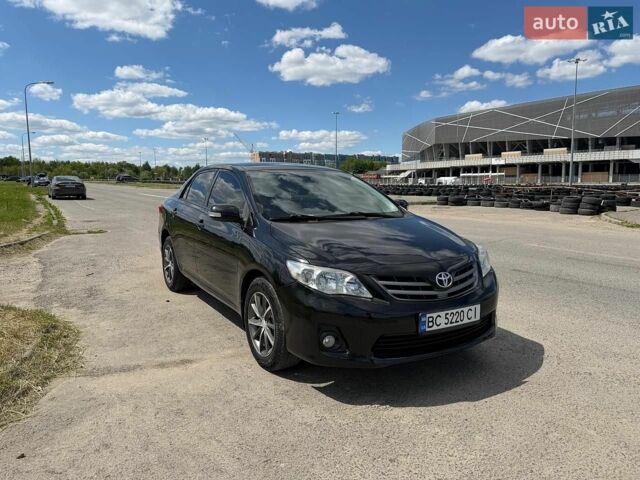 Чорний Тойота Королла, об'ємом двигуна 1.6 л та пробігом 241 тис. км за 7900 $, фото 1 на Automoto.ua
