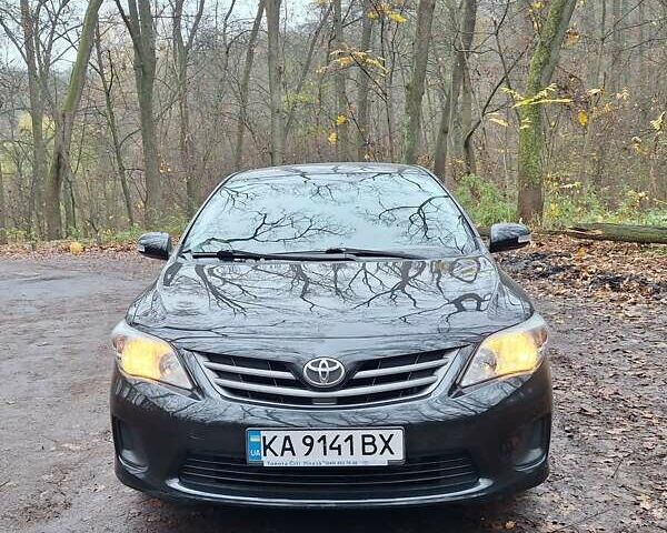 Черный Тойота Королла, объемом двигателя 1.33 л и пробегом 119 тыс. км за 8000 $, фото 1 на Automoto.ua