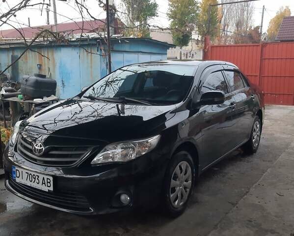 Черный Тойота Королла, объемом двигателя 1.33 л и пробегом 152 тыс. км за 8700 $, фото 1 на Automoto.ua