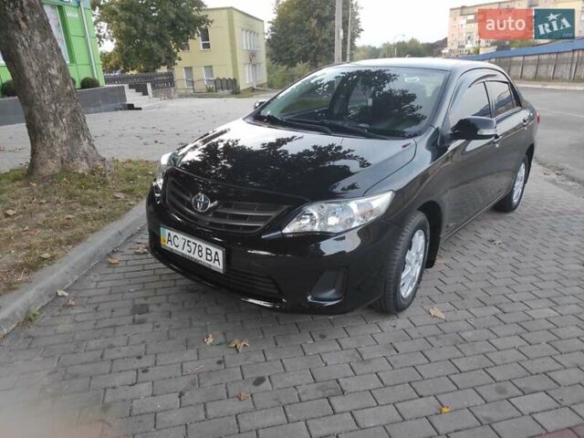 Черный Тойота Королла, объемом двигателя 1.33 л и пробегом 151 тыс. км за 7000 $, фото 1 на Automoto.ua