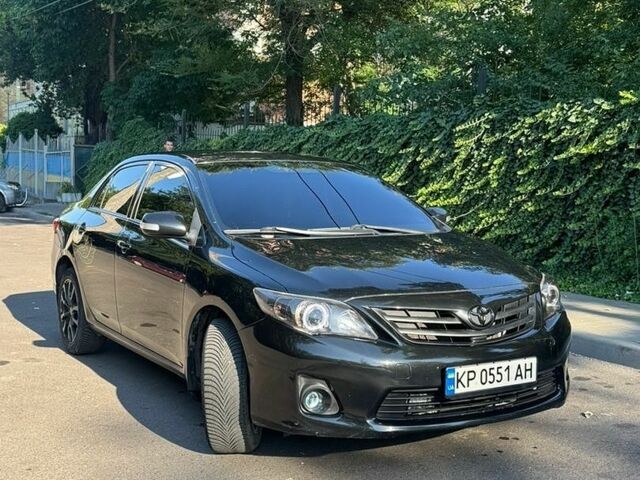 Черный Тойота Королла, объемом двигателя 1.3 л и пробегом 244 тыс. км за 7500 $, фото 1 на Automoto.ua